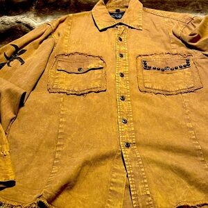 Another really nice 1 of a kind casual shirt. No tears, no buttons missing.